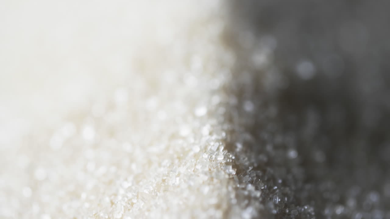 vídeo de primer plano de los granos de arena y copia del fondo del espacio