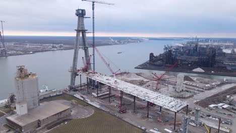 building site of gordie howe international bridge, aerial drone view