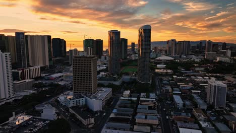 drone footage of honolulu with beautiful fiery skies