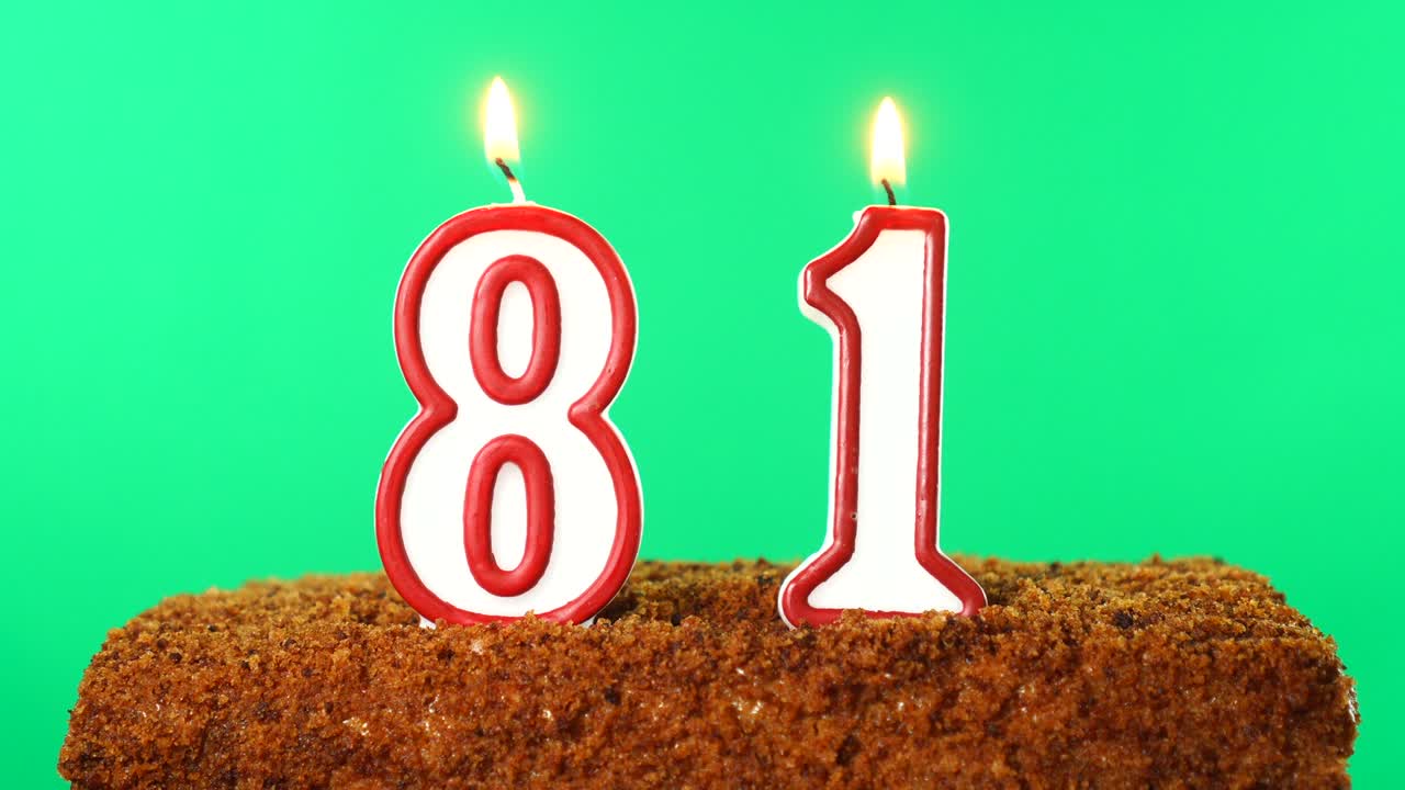 Cake with the number 81 lighted candle. Chroma key. Green Screen. Isolated