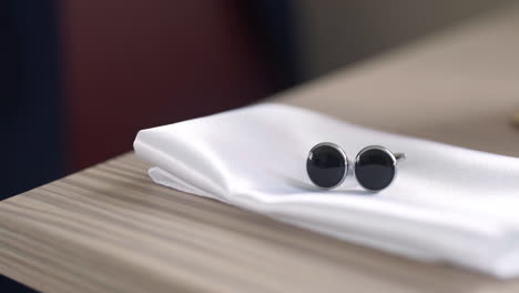 cufflinks on a napkin