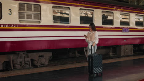 woman traveler at train station