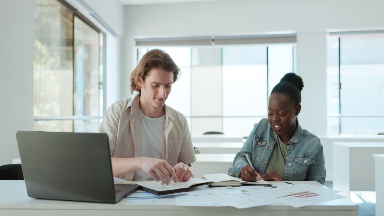 Two people working together on a project