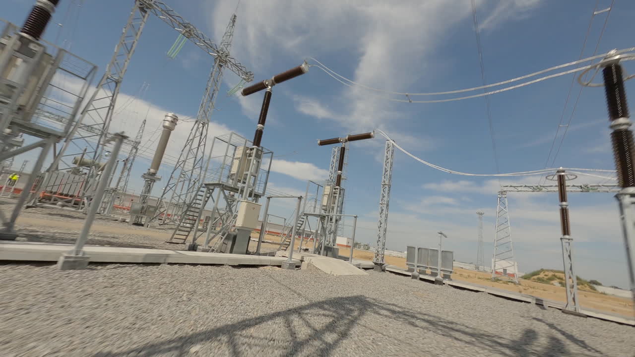 Industrial Site with Power Lines and Equipment