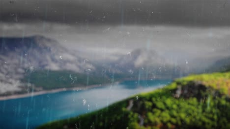 seamless loop background. aerial view over ocean at green forest among the mountains at sunny rainy day. summer nobody nature landscape. drops of rain trickling down on glass. concept: visuals loop