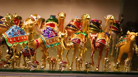 decorative camel figurines in a dubai souvenir shop