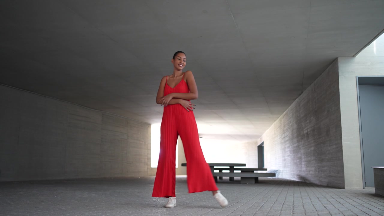 An elegant and graceful dance performance set within a stunning modern architectural space