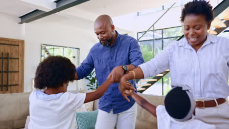 Happy,-home-and-parents-dance-with-children