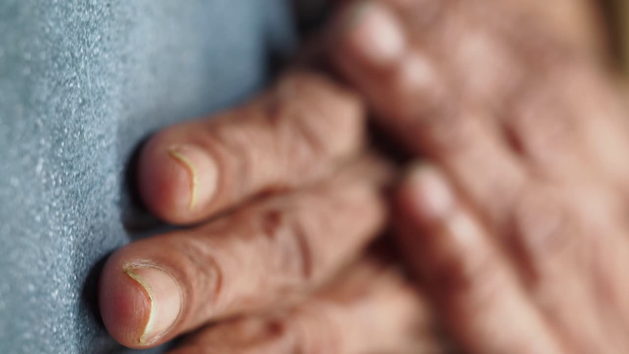 Close-up of aged hands