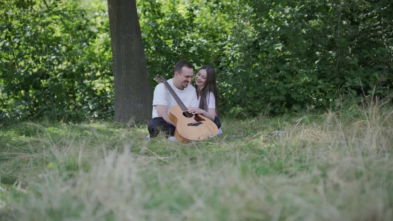 Couple enjoying music in nature
