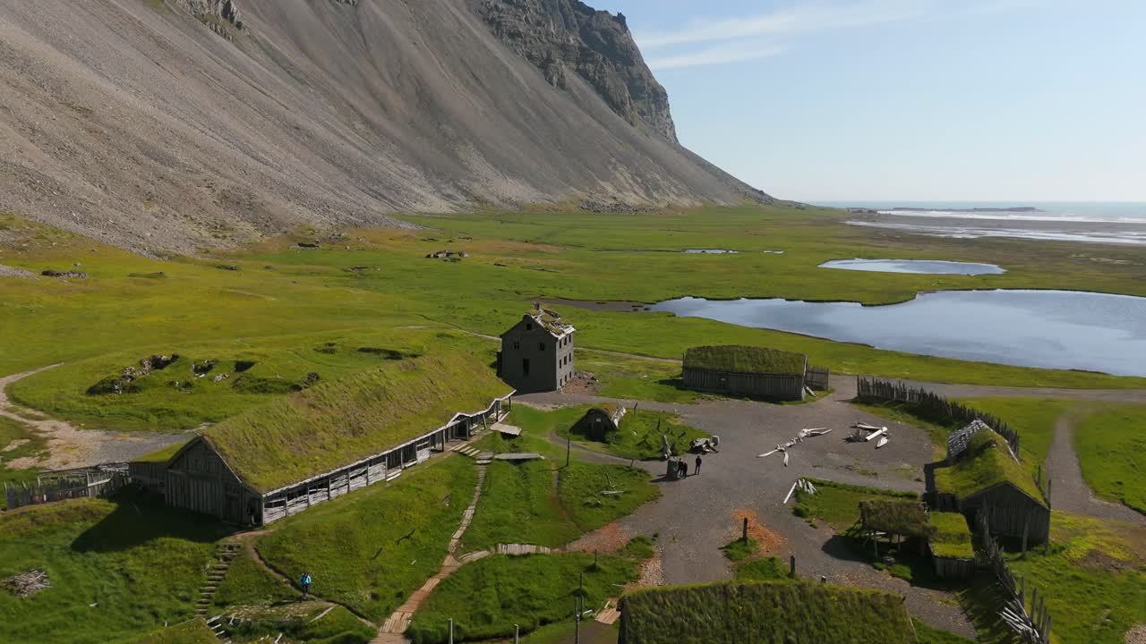 Soar over the picturesque Viking Village, nestled against Iceland’s dramatic coastline. The drone footage captures the essence of Norse heritage amidst rugged natural beauty.