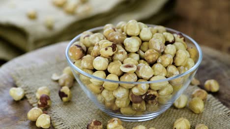 peeled hazelnuts on a rotating plate (seamless loopable)