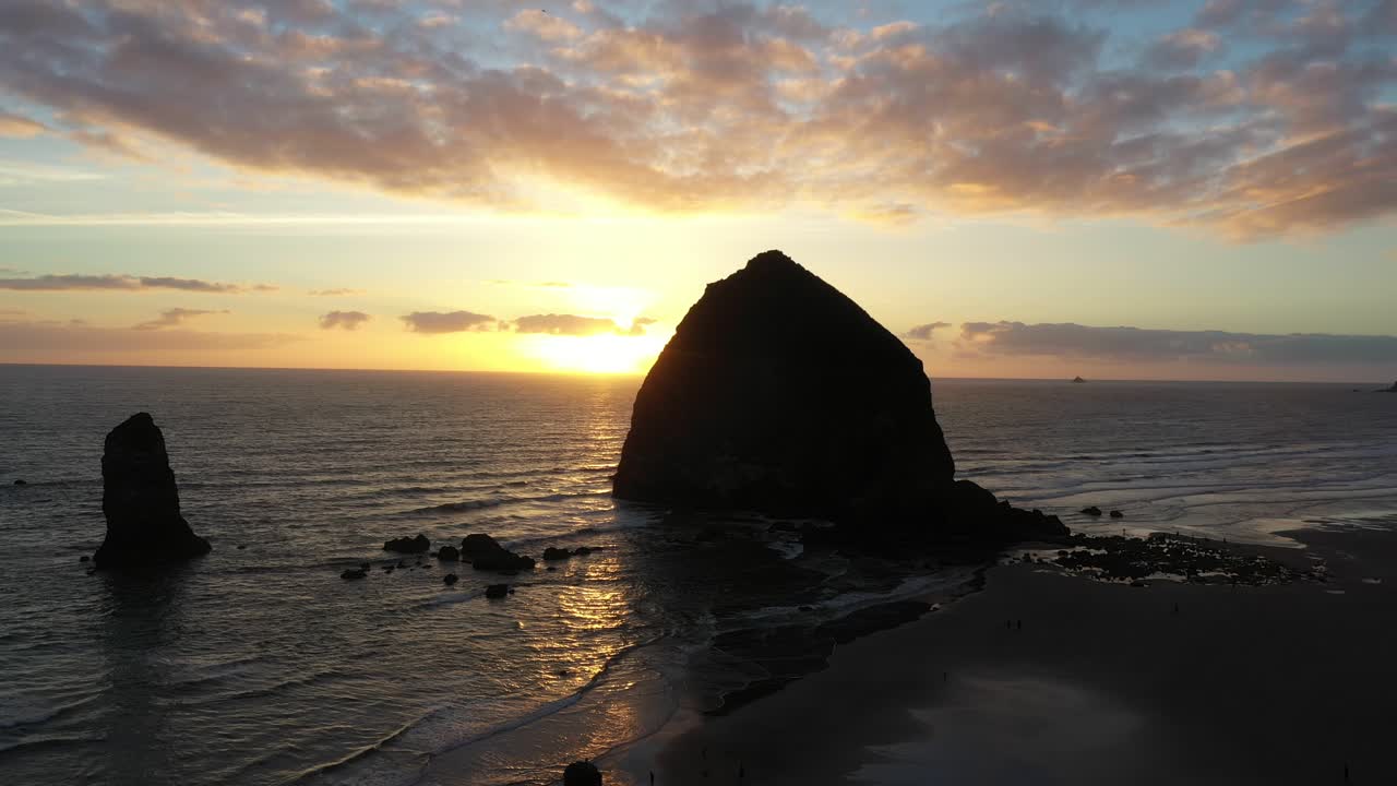Scenic shot of Haystack rock during sunset