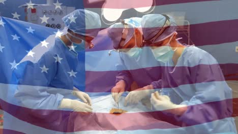 Animation-of-flag-of-usa-waving-over-surgeons-in-operating-theatre