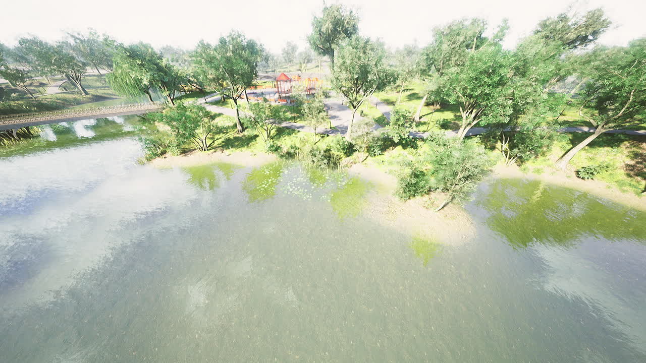 Scenic view of a tranquil riverside park during a sunny day