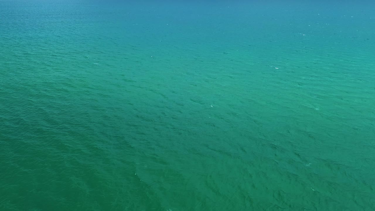 A bird's eye view of beautiful aquamarine Atlantic Ocean waters off the coast of Delray Beach Florida.