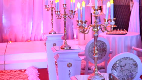 interior of a wedding hall decoration ready for guests.beautiful room for ceremonies and weddings.wedding concept.luxury stylish wedding reception purple decorations expensive hall.wedding decor