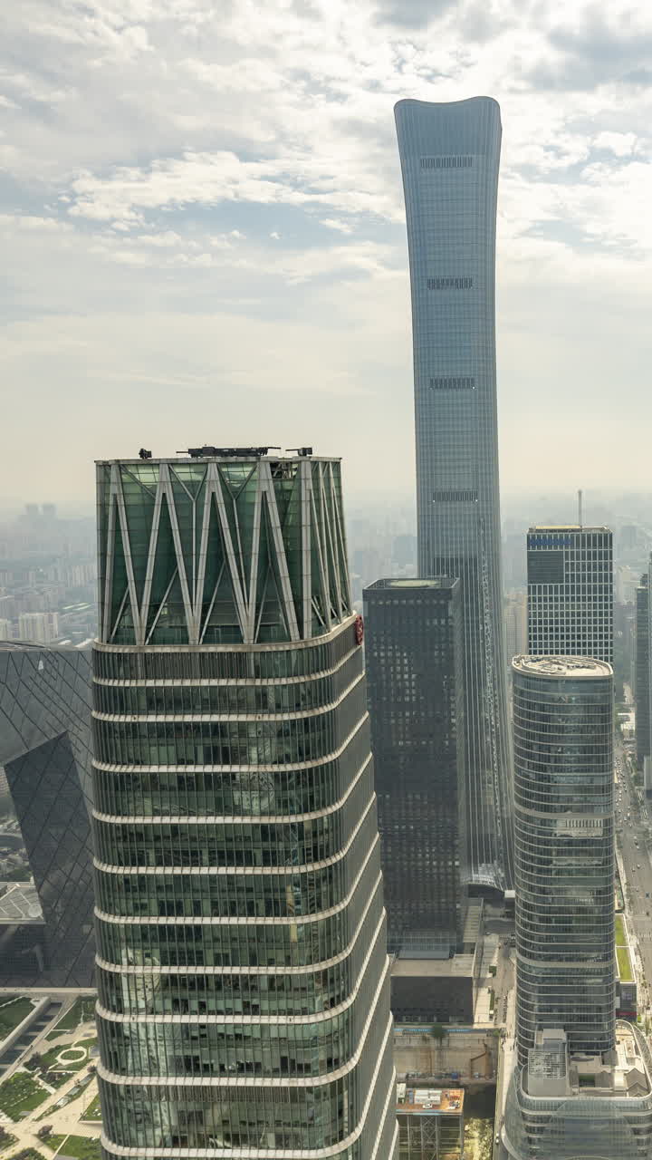 Timelapse of the Beijing city skyline from a high vantage point in vertical
