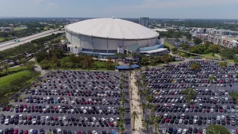 4k aerial drone video of fans arriving at parking lot of tropicana field in downtown st