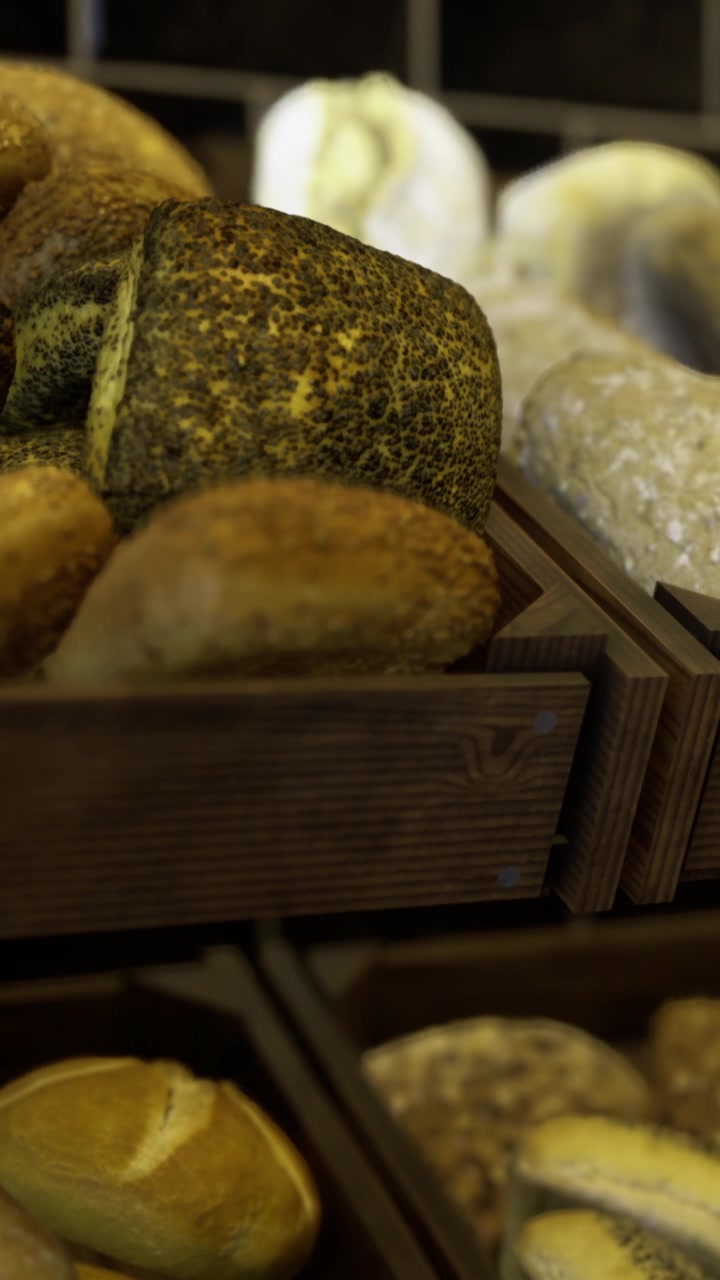 Bread displayed in wooden baskets at a bakery during the day
