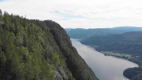 Picturesque-Norwegian-highlands,-mountains-and-lake,-aerial-view