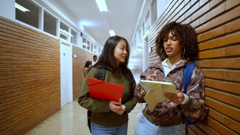 students talking in school hallway