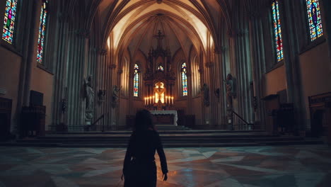 person praying in a church