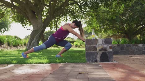 caucasian woman working out in a park