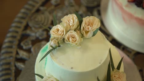 elegant two-tiered wedding cake with floral decor