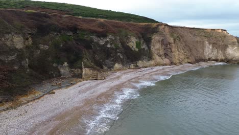 aerial view of dramatic cliffs and coastline