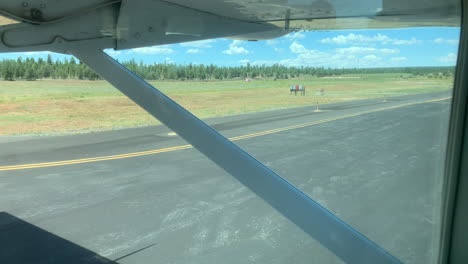 a small tourism plane taxis at the grand canyon private airport