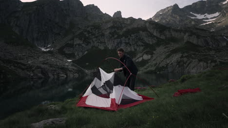 camping in the mountains by a lake