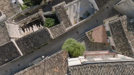 Aerial-view-of-Modica-Alta-Val-di-Noto-Sicily-Old-Baroque-Rooftops-Town-South-Italy