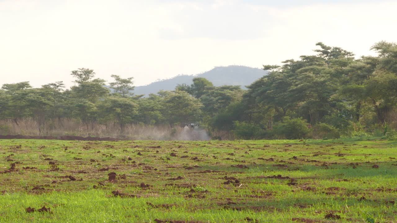 DJI AGRAS t40 spraying chemicals in field