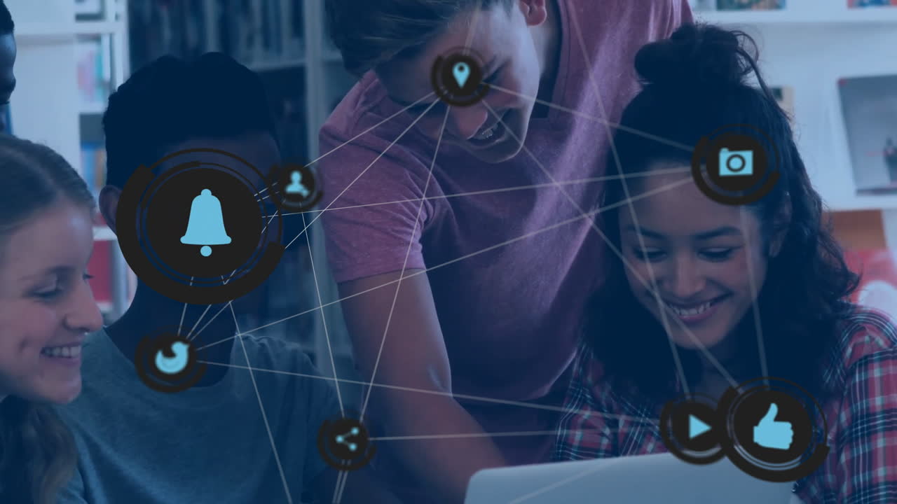 Collaborating on laptop, diverse group with animation of social media icons overlay