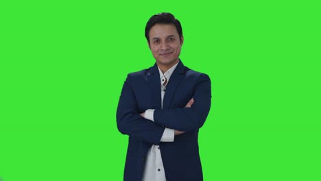 Portrait-of-Happy-Indian-journalist-Green-screen