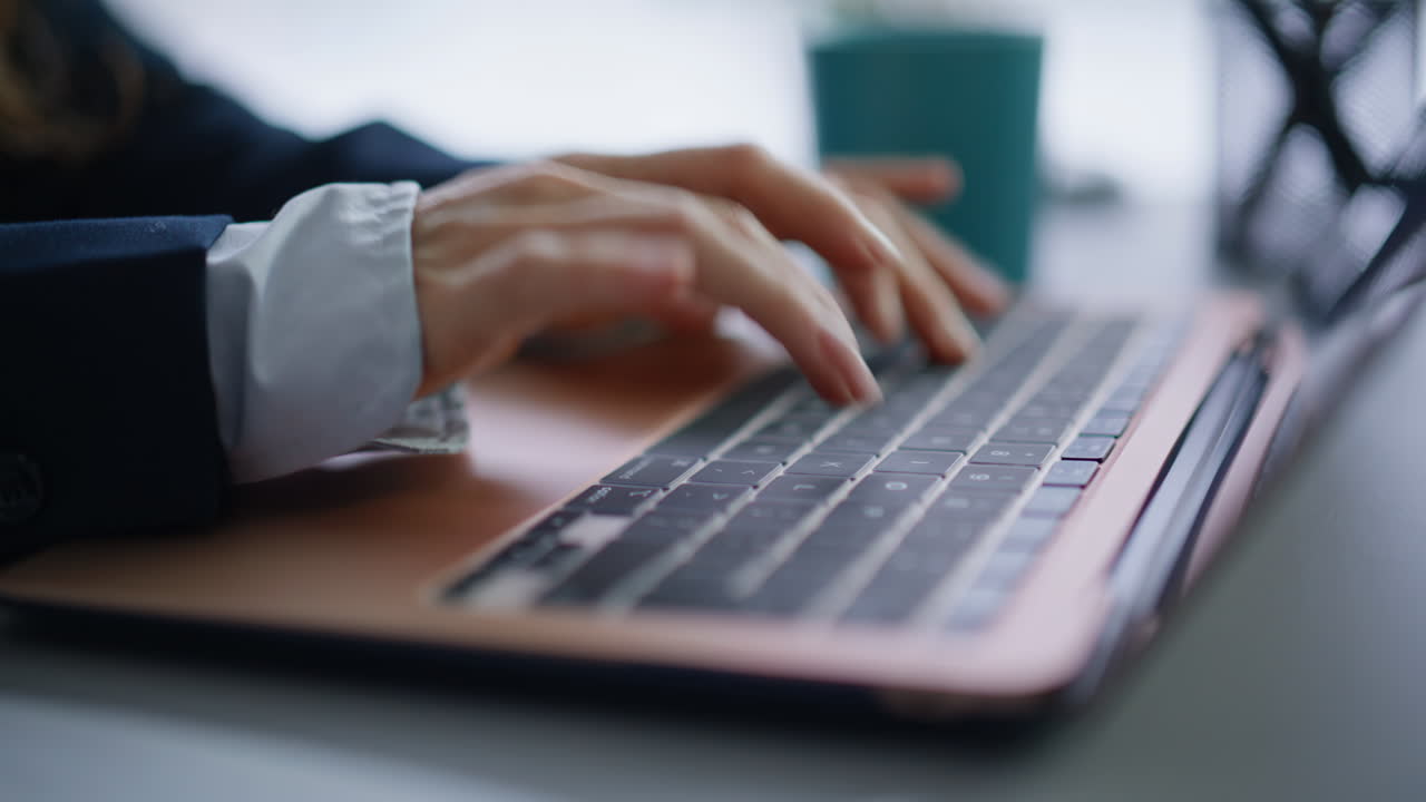 Hands writing email laptop at office closeup. Businesswoman typing on keyboard