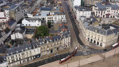 Following-the-tramway-going-to-place-de-la-république-aerial-view-le-Mans-France