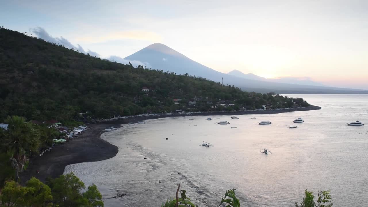Scenic footage of Mount Agung from Amed coastal beach, Bali, capturing volcanic landscapes, coastline views, and one of Indonesia’s most iconic mountains