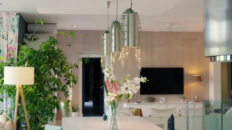 vibrant interior with hanging lights and plants