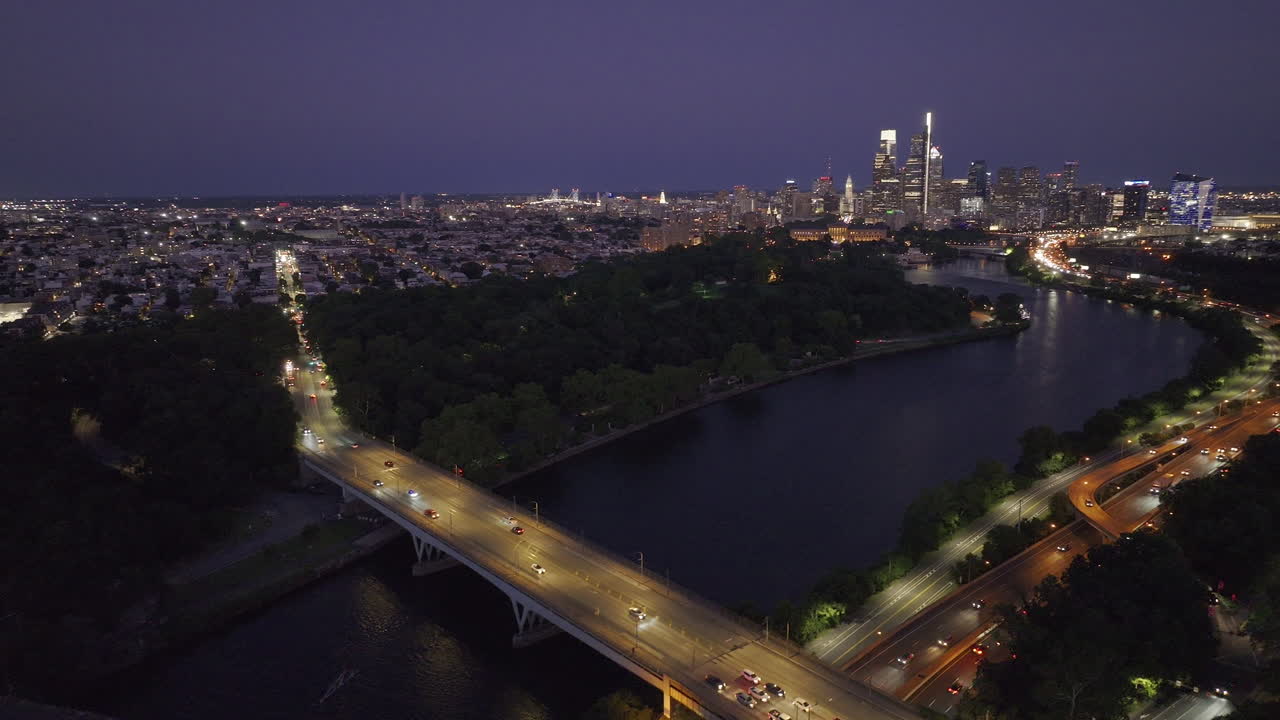 Aerial view of the Philadelphia skyline at night. Shot along the Schuylkill River