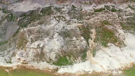 Aerial-Drone-top-down-over-sea-cliffs-Isle-of-Wight