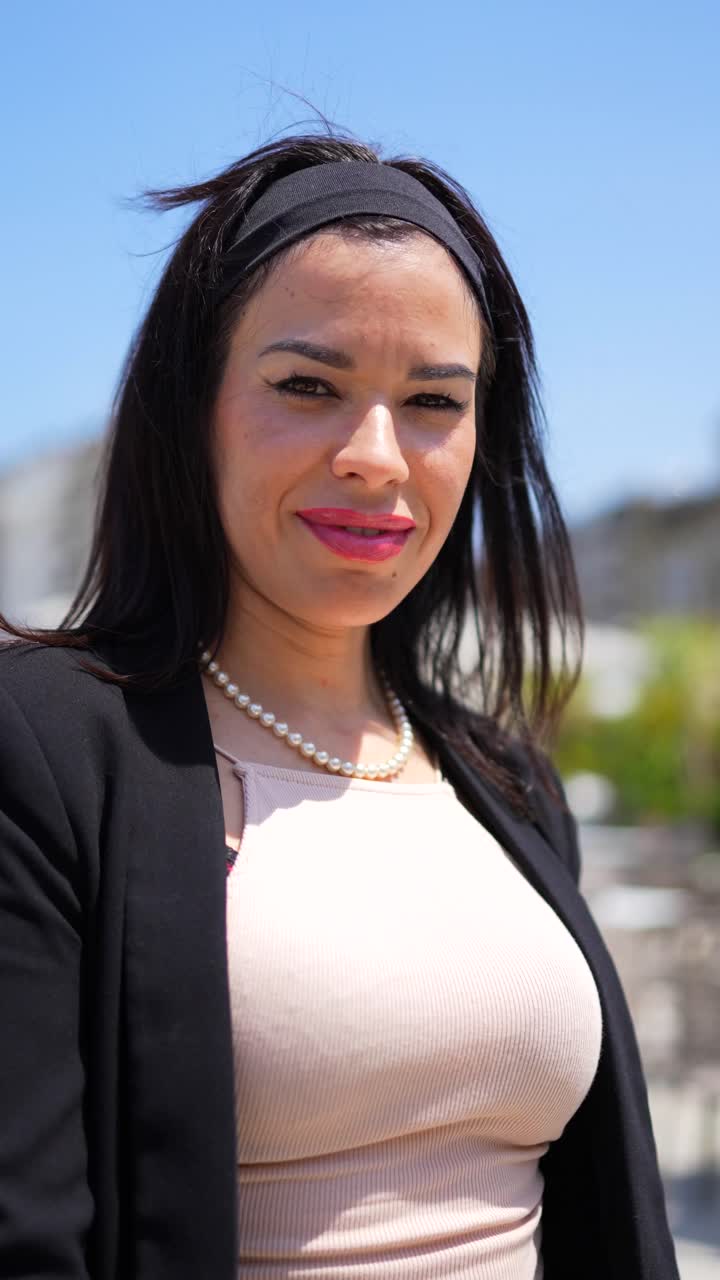 Woman in Stylish Outfit with Sunglasses and Pearl Necklace