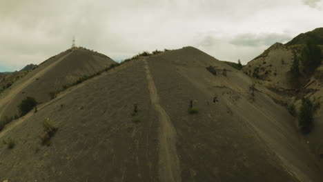 footpath on large mountain ridge fpv drone. trekking trails promising adventures attract explorers to embrace challenge. highland terrain beauty