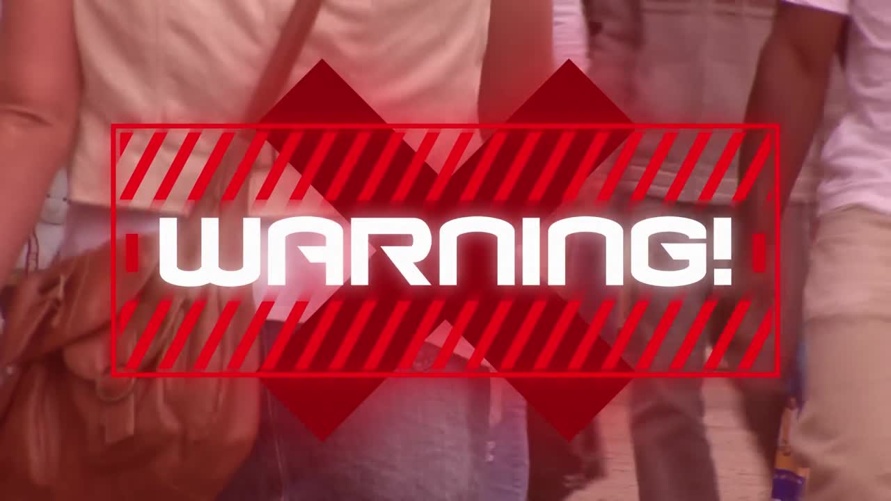 Animation of the word Warning written in red frame on city background.