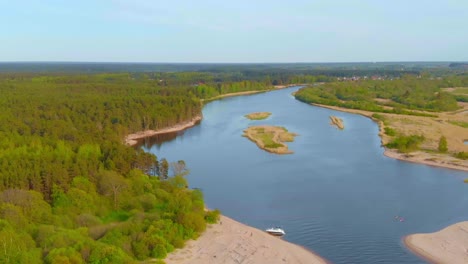 Aerial-Shot-Of-Carnikava-Blue-River-In-Heart-Of-Peaceful-Heaven,-Gaija