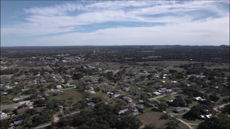 aerial shot over johnson city, texas and hill country, small town