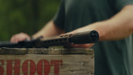 a person holding a rifle