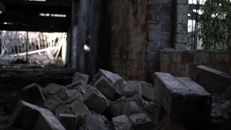 Pile-of-bricks-rubble-in-abandoned-building-tilting-shot