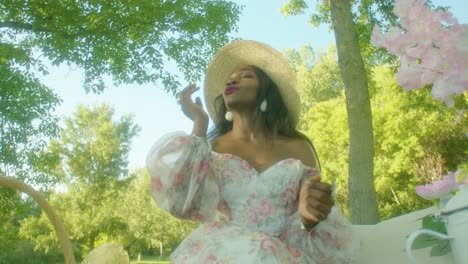 Black-Woman-singing-dancing-enjoying-music-on-picnic-in-park-close-up